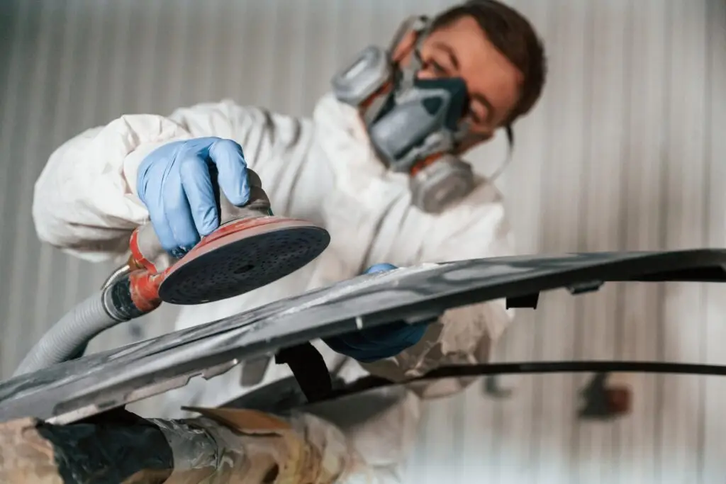 polishing the surface repairman is working with c 2024 02 28 19 11 55 utc 1