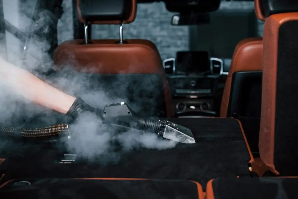 uses steam cleaner modern black automobile is in 2023 11 27 05 29 57 utc 1