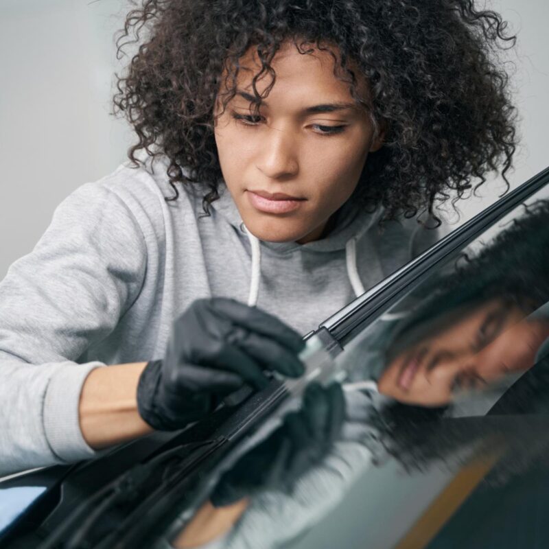worker ceramic coating windscreen surface aft 2023 11 27 05 28 58 utc 1