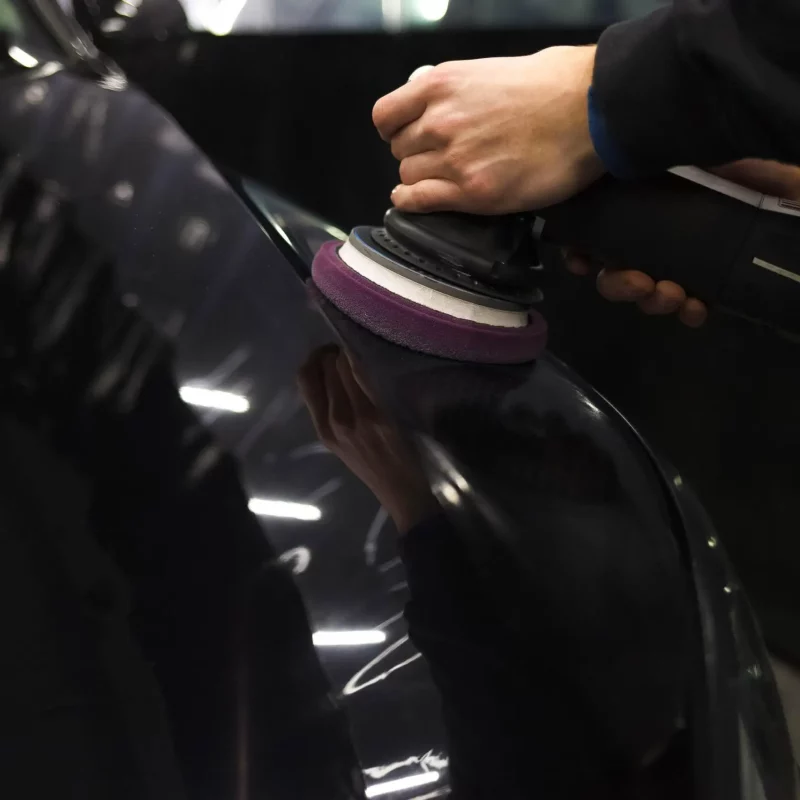 worker polishes a car s paintwork with a car 2024 10 18 08 19 53 utc 1 scaled